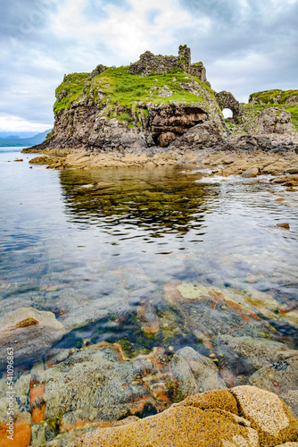 Dunscaith Castle ruins,overlooking Loch Slapin,built on a large rock,,Isle of Skye,Scotland,UK. photo