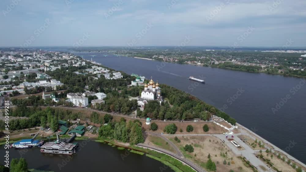 Yaroslavl, Russia - August 22 2022: City, church, river and ship Yaroslavl, Russia - August 22 2022: City, church, river and ship