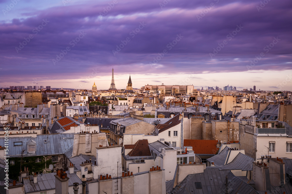 Eiffel Tower and Invalides in Paris Skyline at dramatic evening, France