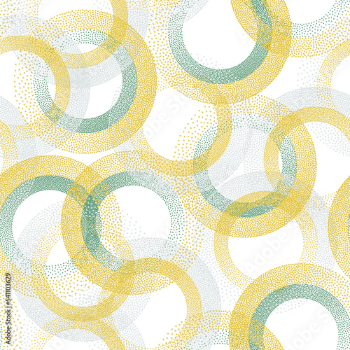 Circle ring shapes of dots contemporary vector seamless pattern.