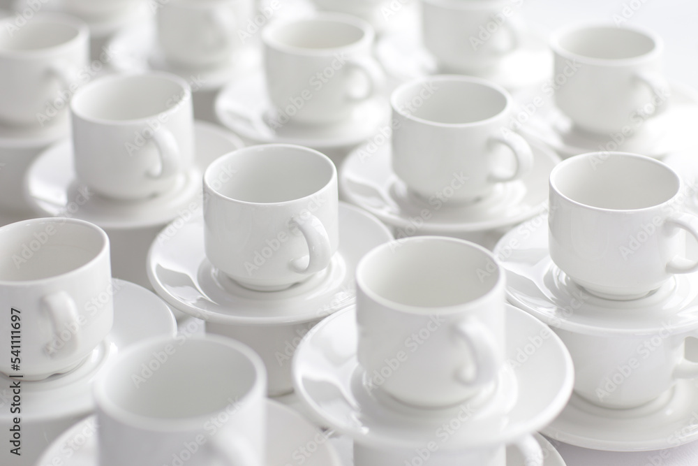 Espresso cups with saucers stacked on top of each other Espresso cups with saucers stacked on top of each other