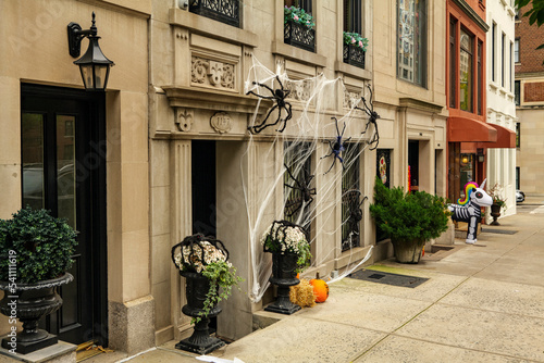 Front of apartment building decorated with spider web for Halloween holiday in Manhattan New York. High-quality photo