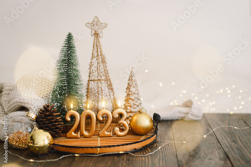 Happy New Years 2023. Christmas background with fir tree, cones and Christmas decorations. Christmas holiday celebration. New Year concept.