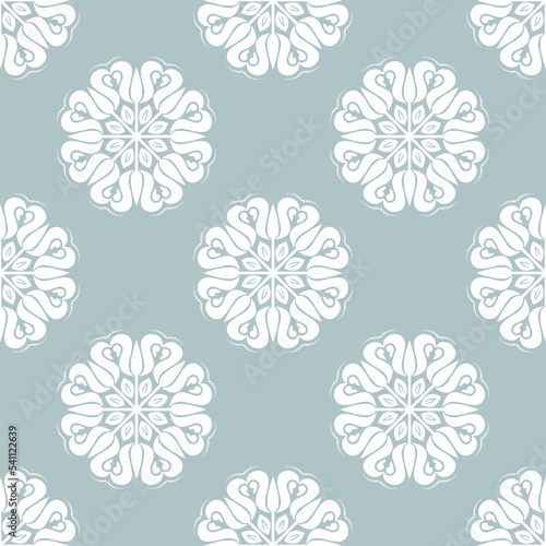 Floral vector light blue and white ornament. Seamless abstract classic background with flowers. Pattern with repeating floral elements. Ornament for wallpaper and packaging
