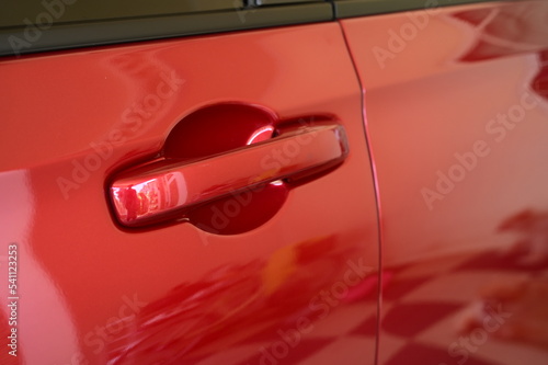 door handle of red car, transpotation industry