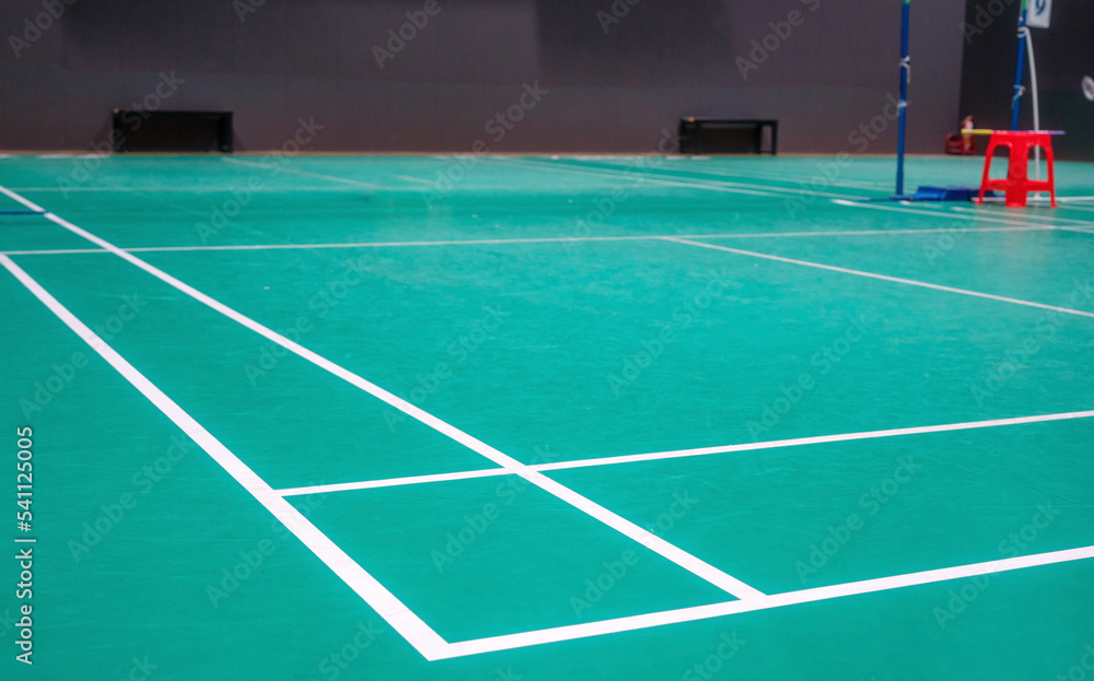 Empty green badminton court for playing Empty green badminton court for playing