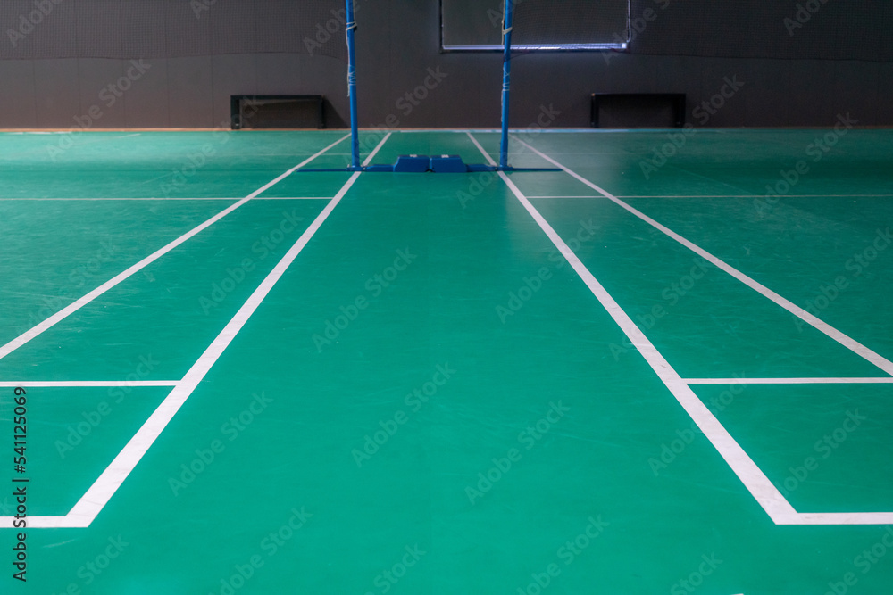 Empty green badminton court for playing Empty green badminton court for playing