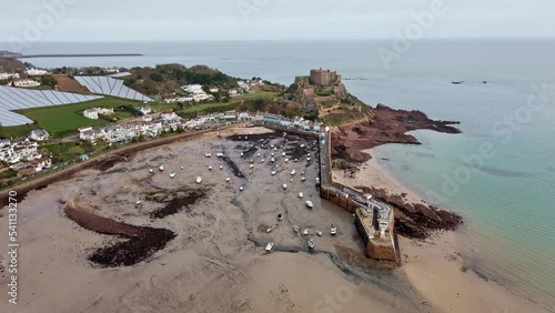 Beautiful aerial drone footage view of Mont Orgueil Castle on the cliff photo