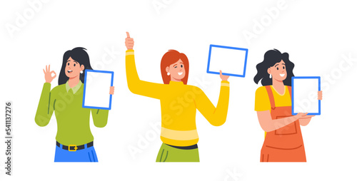 Joyful Women Pointing On Empty Screen Of Digital Tablets and Gesturing. Female Characters Presenting Advertising or App