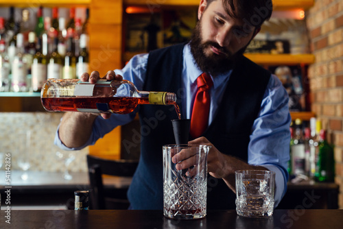 Bartender guy working prepare cocktail skills