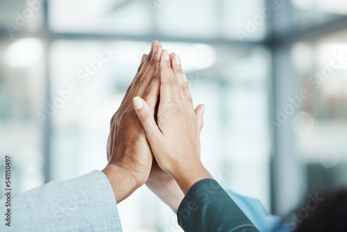 Hands, high five and motivation with a team working in collaboration together in the office. Team building, success and partnership with an employee group in celebration of reaching a target or goal