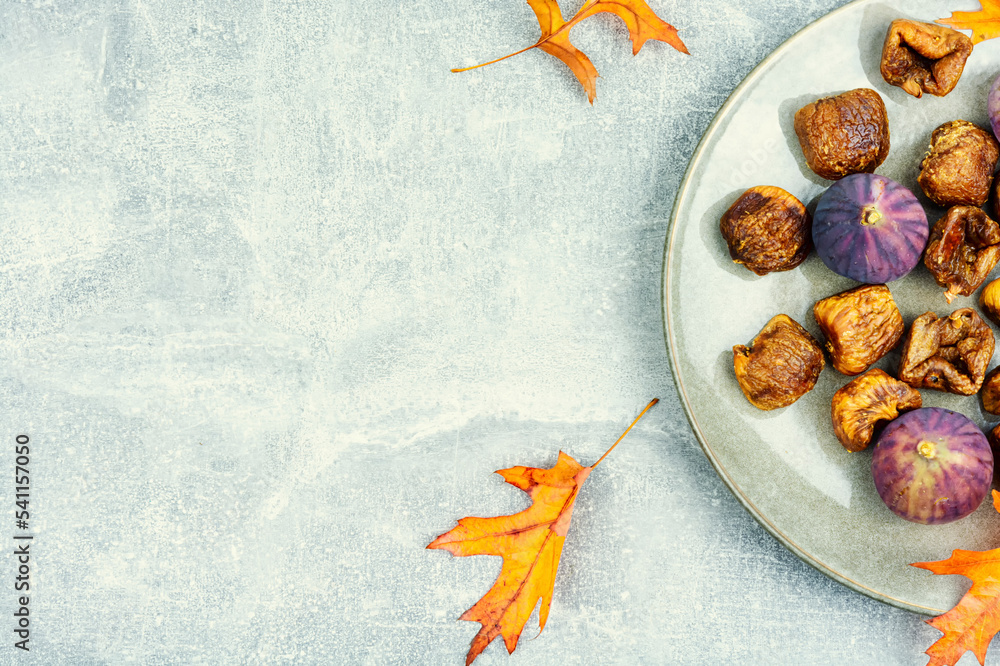 Dried and fresh figs, autumnal dessert Dried and fresh figs, autumnal dessert
