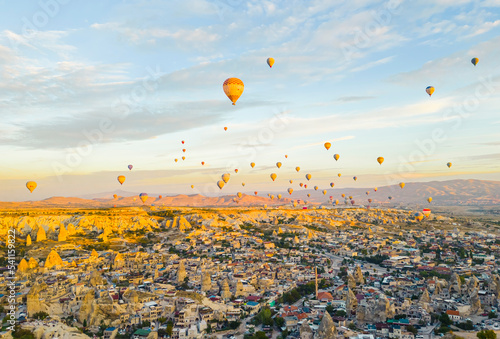 one of the greatest place you can see in the world - Cappadocia and its well-known hot air balloons's shot dusring sunrise. High quality photo