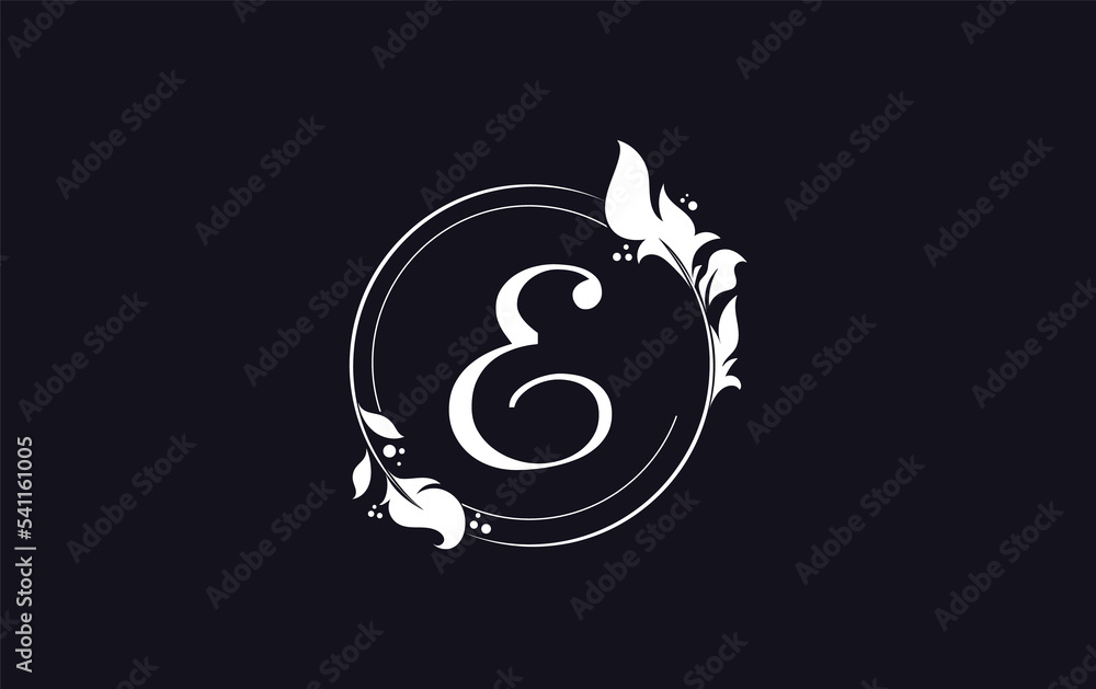 Golden circle leaf and beauty logo design with the letters and alphabets for brand and business Golden circle leaf and beauty logo design with the letters and alphabets for brand and business