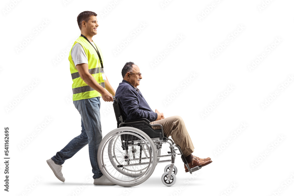 Full length profile shot of a community worker pushing a mature man in a wheelchair Full length profile shot of a community worker pushing a mature man in a wheelchair