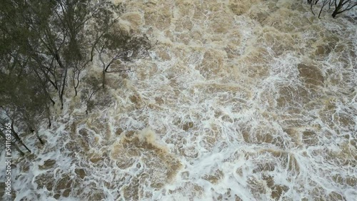 Lake Eppalock dam spillway overflowing into the Campaspe River near Bendigo after heavy spring rain 2022