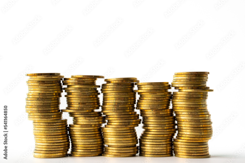 Gold coin stacks on white background. rising money investment and increasing profits. Gold coin stacks on white background. rising money investment and increasing profits.