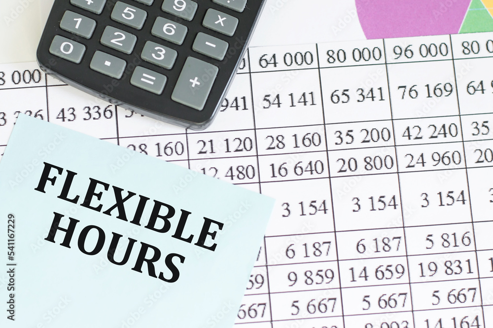 Flexible hours text on a card on the background of financial reports on the table, business concept Flexible hours text on a card on the background of financial reports on the table, business concept