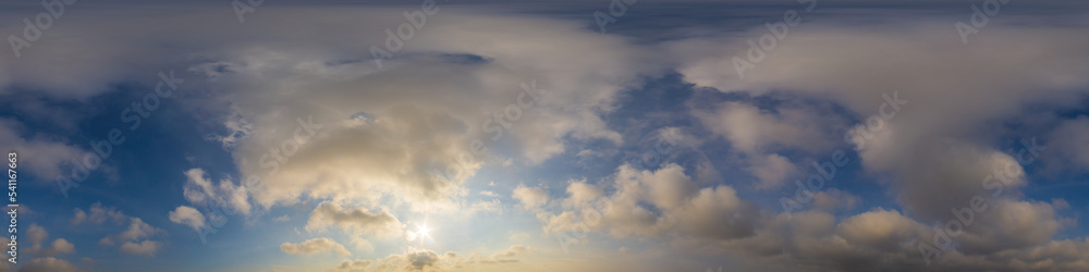 Panorama of a dark blue sunset sky with golden Cumulus clouds. Seamless hdr 360 panorama in spherical equiangular format. Full zenith for 3D visualization, sky replacement for aerial drone panoramas.