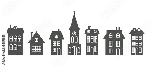 Fotografija Silhouette of cottages and church in neighborhood
