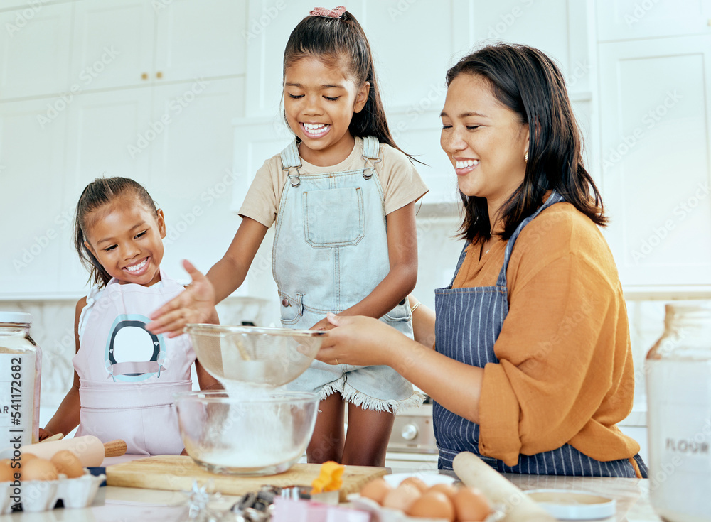 Happy family cooking, mother and children help mom with egg, wheat flour and bake food in home kitchen. Love, youth kids teamwork on baking and enjoy fun, bonding or quality time helping support mama