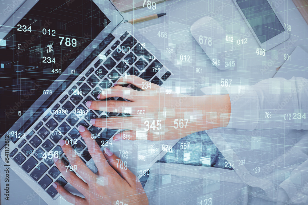 Double exposure of woman hands working on computer and data theme hologram drawing. Top View. Technology concept. Double exposure of woman hands working on computer and data theme hologram drawing. Top View. Technology concept.