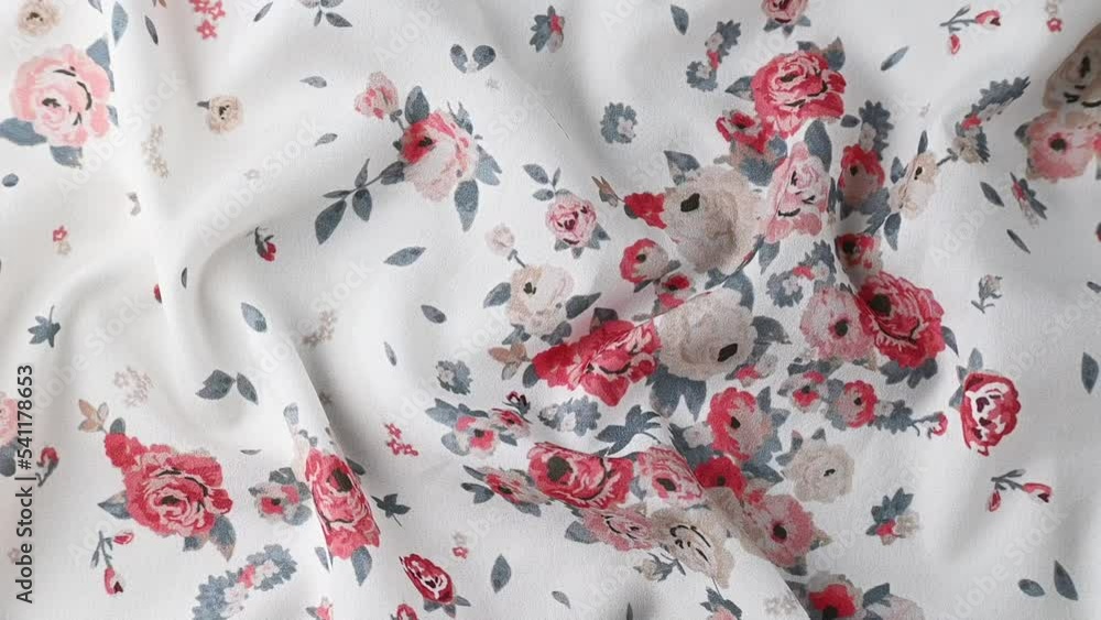 Fashionable floral cloth, ondulate modern textile close up view
Fashionable floral cloth, ondulate modern textile close up view
