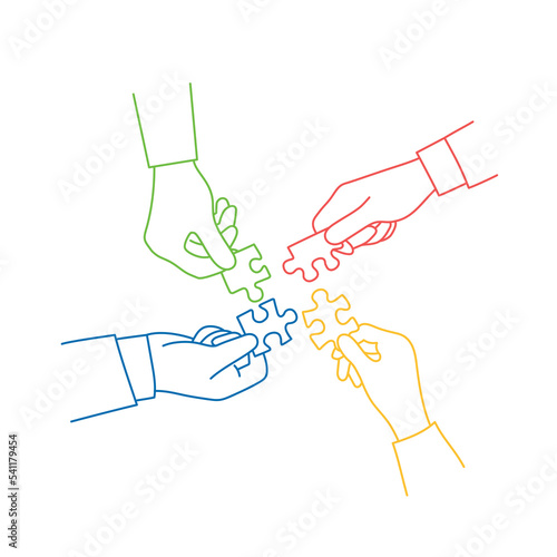 Hands of business people holds in hand a jigsaw puzzle, multiethnic people.