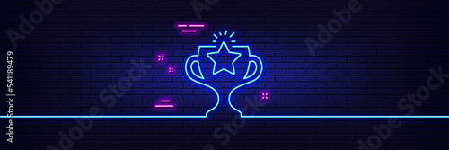 Neon light glow effect. Winner cup line icon. Sport Trophy with Star symbol. Victory achievement or Championship prize sign. 3d line neon glow icon. Brick wall banner. Victory outline. Vector photo