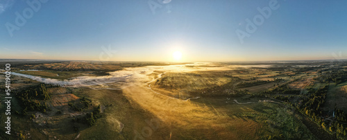Backwaters and oxbow lakes of foggy river Bug - panoramic view from drone - August 2020, Poland
