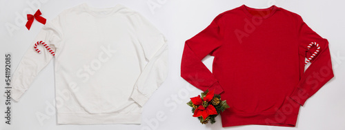 Set Close up red white blank template sweatshirt with copy space. Christmas Holiday concept. Top view mockup hoodie, holidays decorations on white background. Happy New Year accessories. Xmas outfit photo