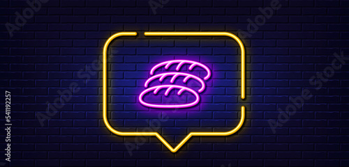Neon light speech bubble. Bread line icon. Bakery food sign. Pastry baguette symbol. Neon light background. Bread glow line. Brick wall banner. Vector