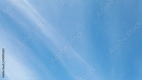 Blue sky on white line cotton clouds .  Cumulus cloud cloudscape time lapse,Summer blue sky time lapse in Nature weather tropical. Cloud time lapse nature background in summer season top view 
