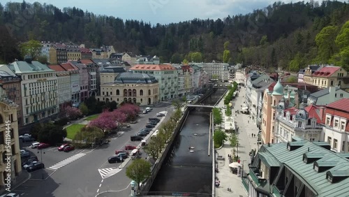 Aerial drone view of Karlovy Vary or Carlsbad city centre with river and colonnade photo