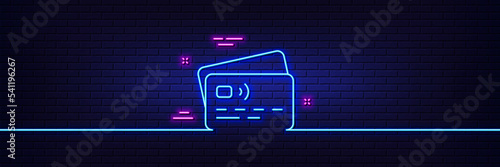 Neon light glow effect. Credit card line icon. Bank money payment sign. Non-cash pay symbol. 3d line neon glow icon. Brick wall banner. Card outline. Vector