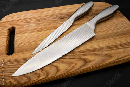 The perfect tools for a great chef. Set of kitchen knives and cutting board