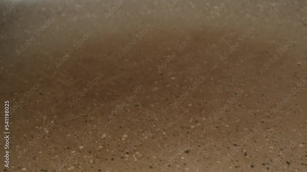 I turn the pancake over in a frying pan, with a silicone spatula. extreme close-up. I turn the pancake over in a frying pan, with a silicone spatula. extreme close-up.
