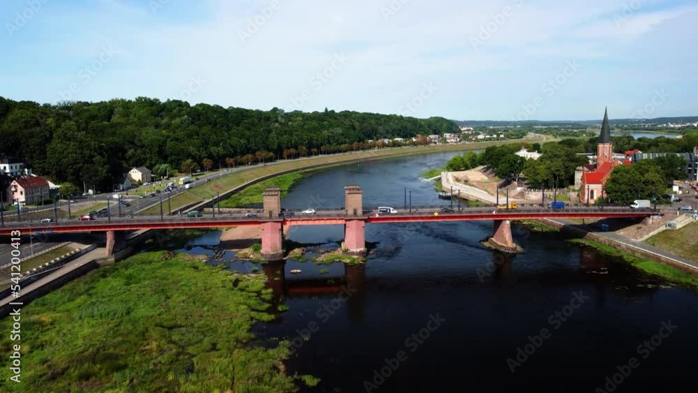 Aerial view of the Vytautas the Great Bridge through Nemunas river in Kaunas old town in Lithuania 4K Aerial view of the Vytautas the Great Bridge through Nemunas river in Kaunas old town in Lithuania 4K