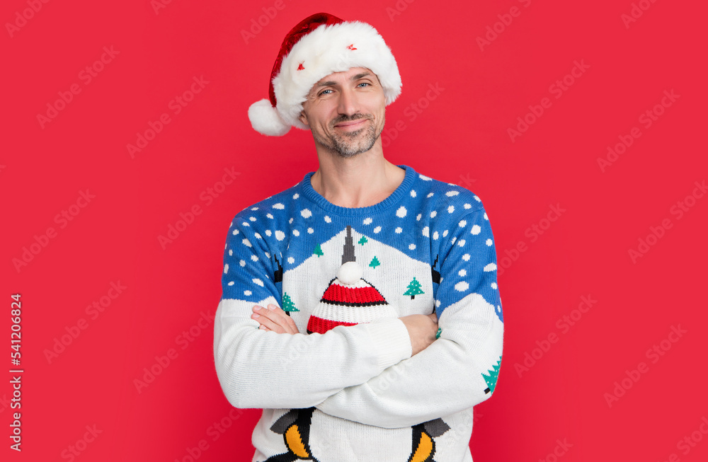 christmas mood. cheerful man isolated on red background wear christmas sweater. christmas mood. cheerful man isolated on red background wear christmas sweater.