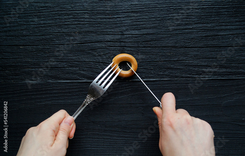 hand holding a spoon