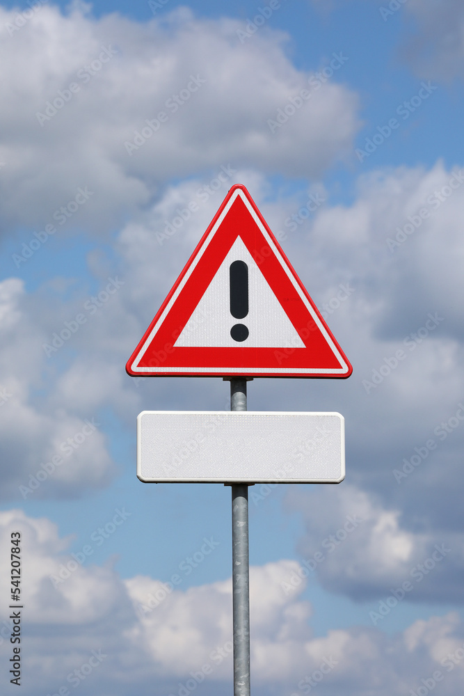A sign with a exclamation mark warning for a dangerous situation ahead. At the bottom a smaller sign on which an editor can place a text
A sign with a exclamation mark warning for a dangerous situation ahead. At the bottom a smaller sign on which an editor can place a text