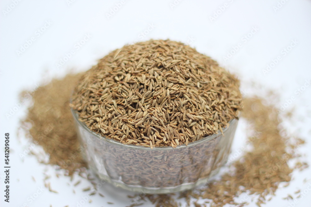 Cumin seeds decorated on white background Cumin seeds decorated on white background