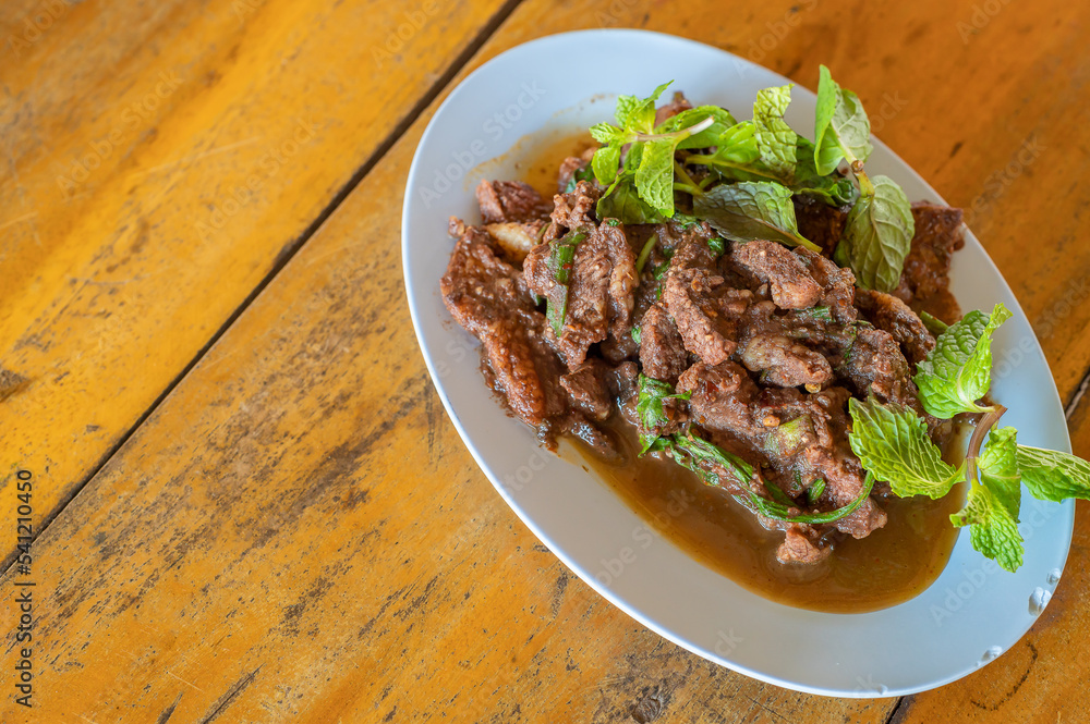Spicy minced beef salad, Thai Spicy minced beef meat, (Larb Beef) local style food, North-Eastern Food of Thailand, Spicy food.
