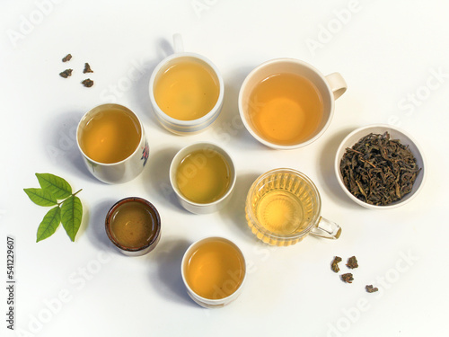cup of tea on white background. Oolong tea and green tea.