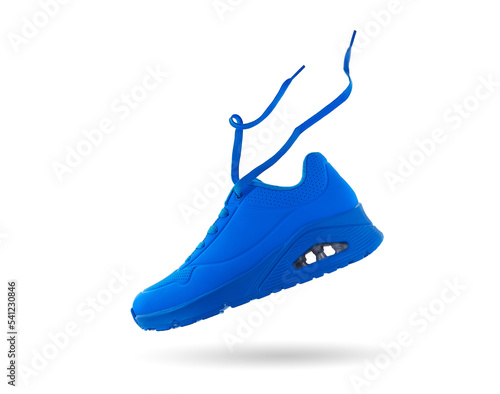 Flying blue sneaker isolated on white background. Fashionable stylish sports casual shoes. Creative minimalistic footwear layout. Lifestyle product photo, levitation and urban style concept.