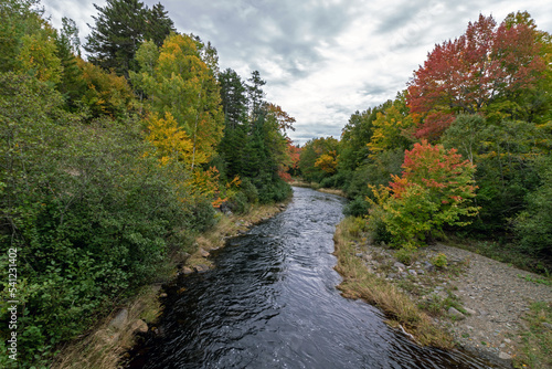 Gulf Hagas in the northen Maine Woods as the Pleasant River is surrounded by early fall foliage  photo