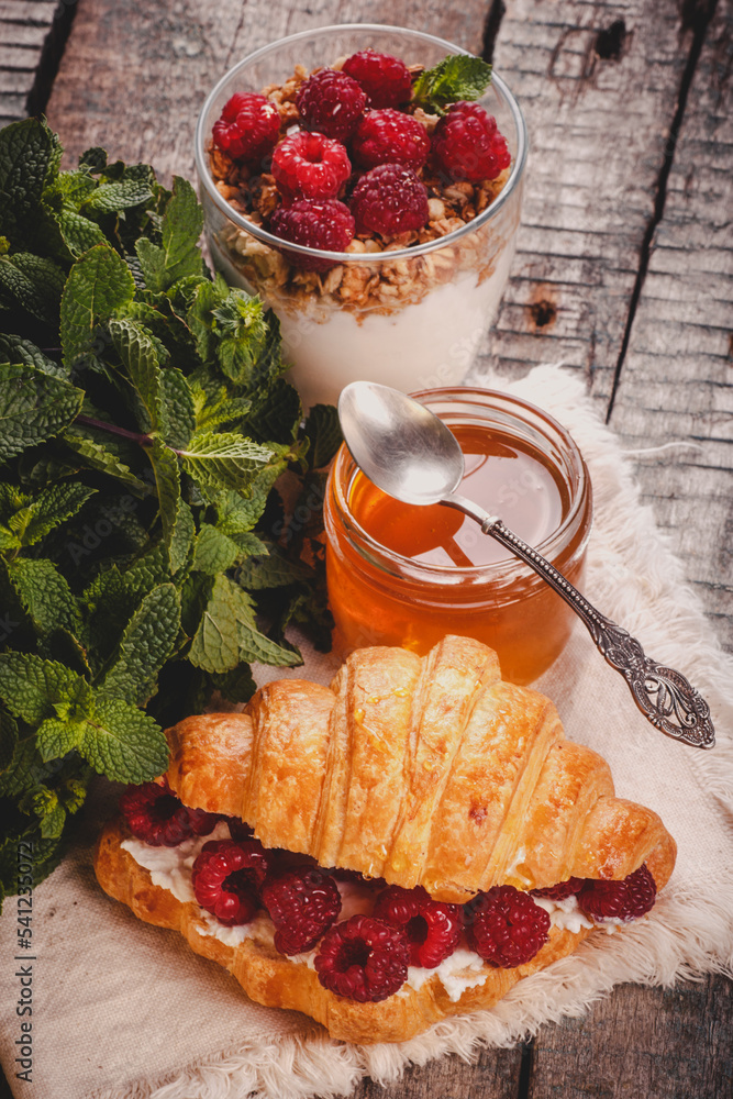 Croissant with raspberries, ricotta and honey