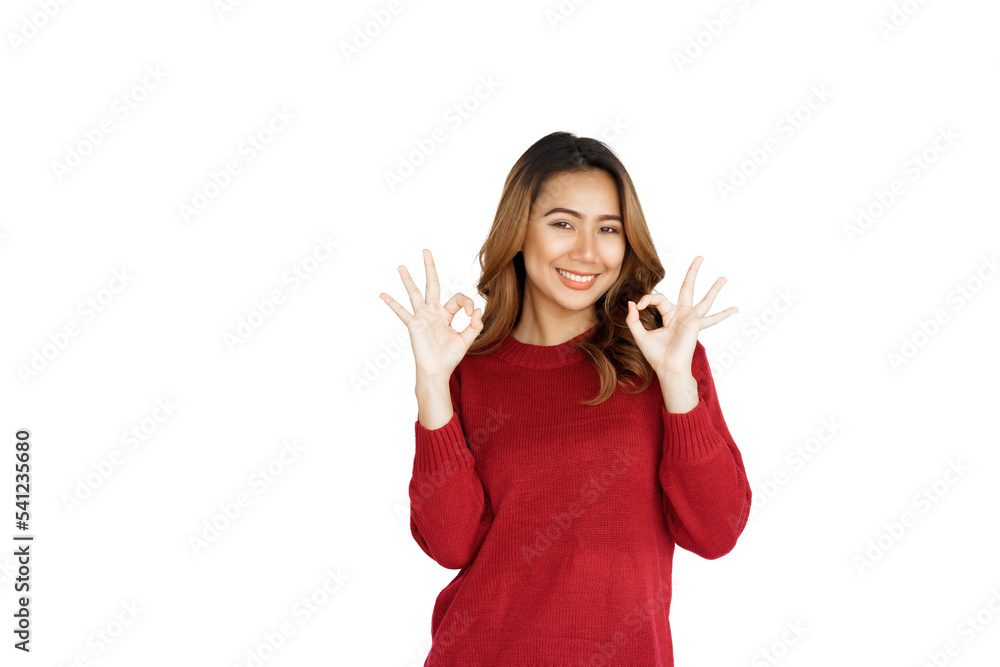Excited confident asian happy woman in winter sweater red color isolated on white background. Showing OK fingers hand Excited confident asian happy woman in winter sweater red color isolated on white background. Showing OK fingers hand