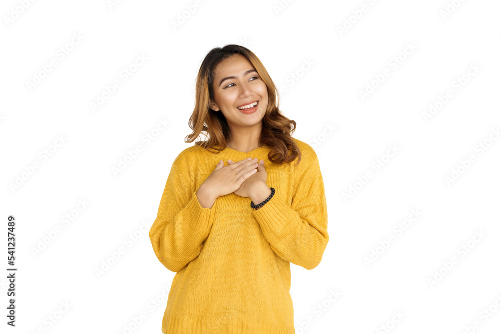 Attractive positive young asian brunette woman in yellow sweater on white background. Attractive positive young asian brunette woman in yellow sweater on white background.