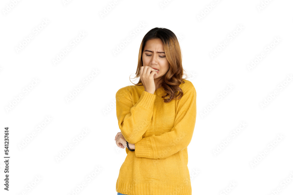 Attractive positive young asian brunette woman in yellow sweater on white background. thoughtful or thinking serious Attractive positive young asian brunette woman in yellow sweater on white background. thoughtful or thinking serious